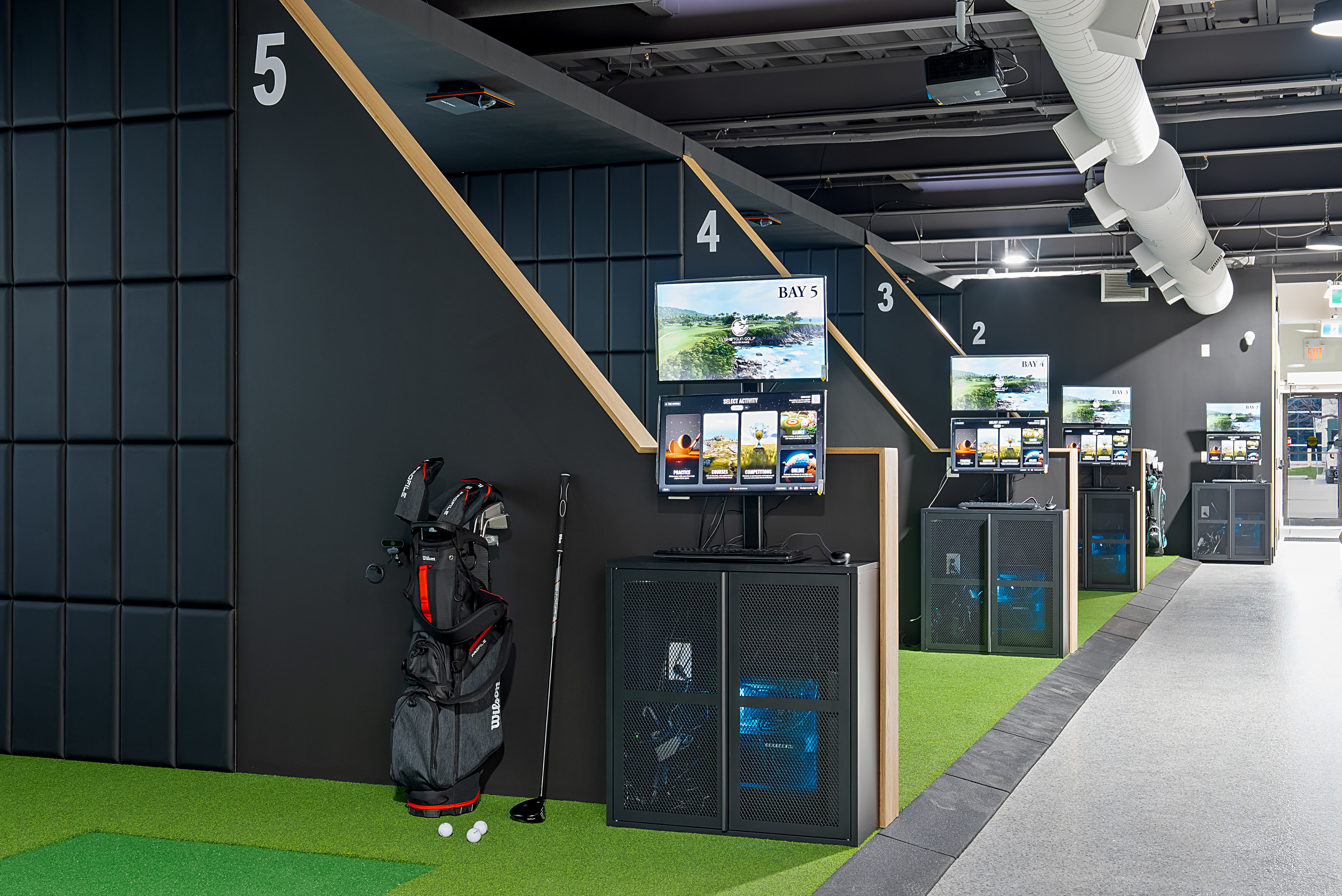 Detailed commercial simulator bays with custom wall panels